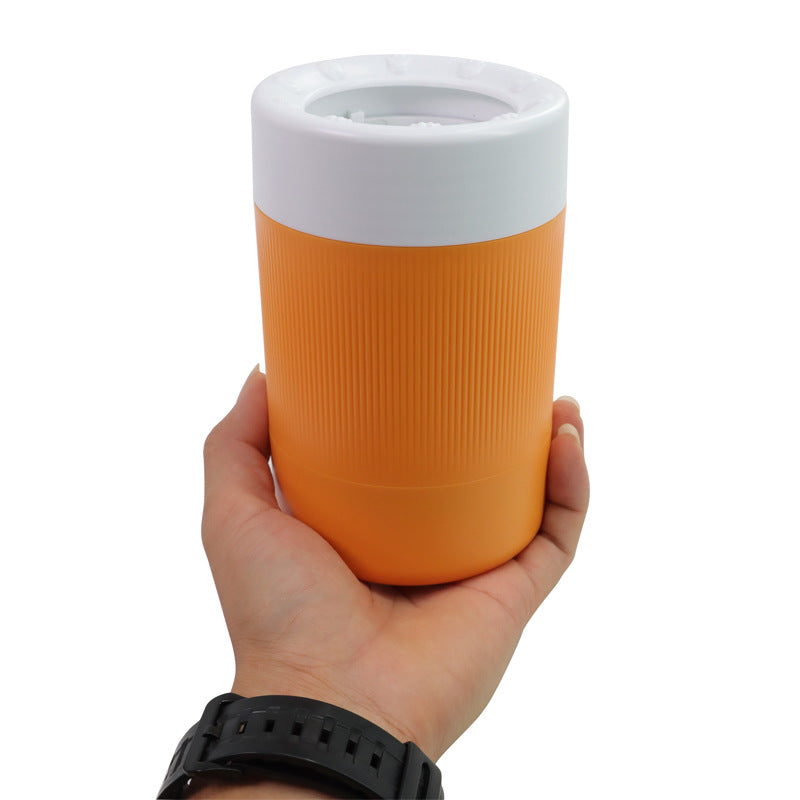 Orange tumbler with white lid held by a hand on a white background