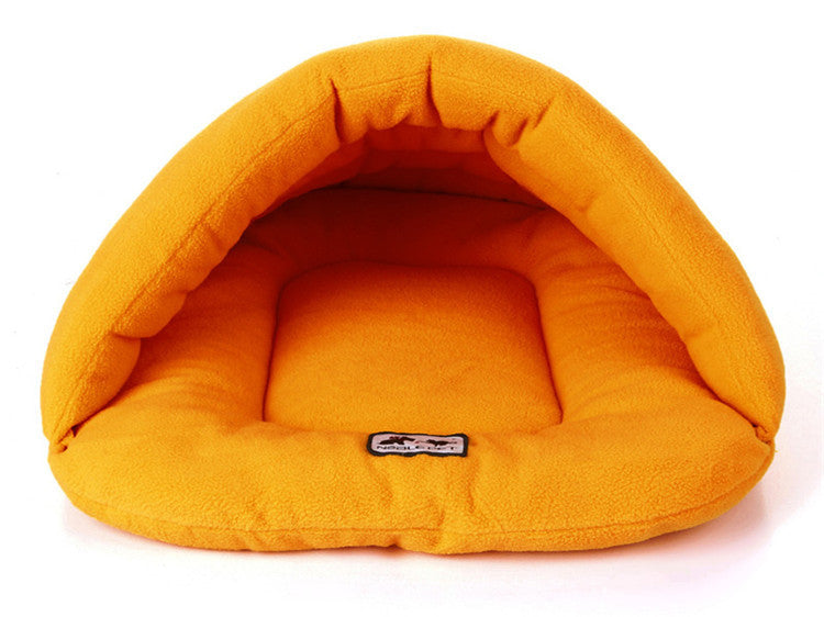 Orange pet bed with a visible brand label on a white background