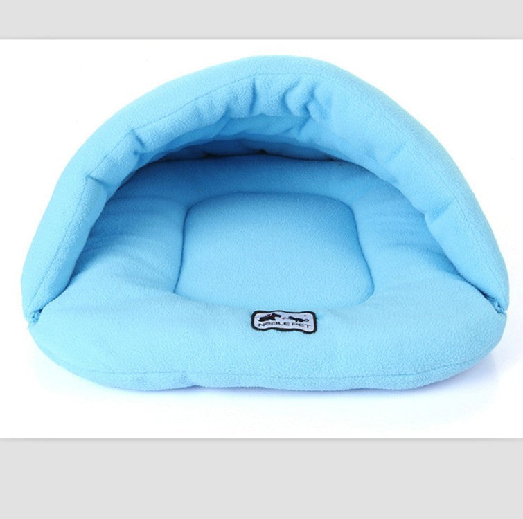 Light blue pet bed with a visible brand logo on a white background